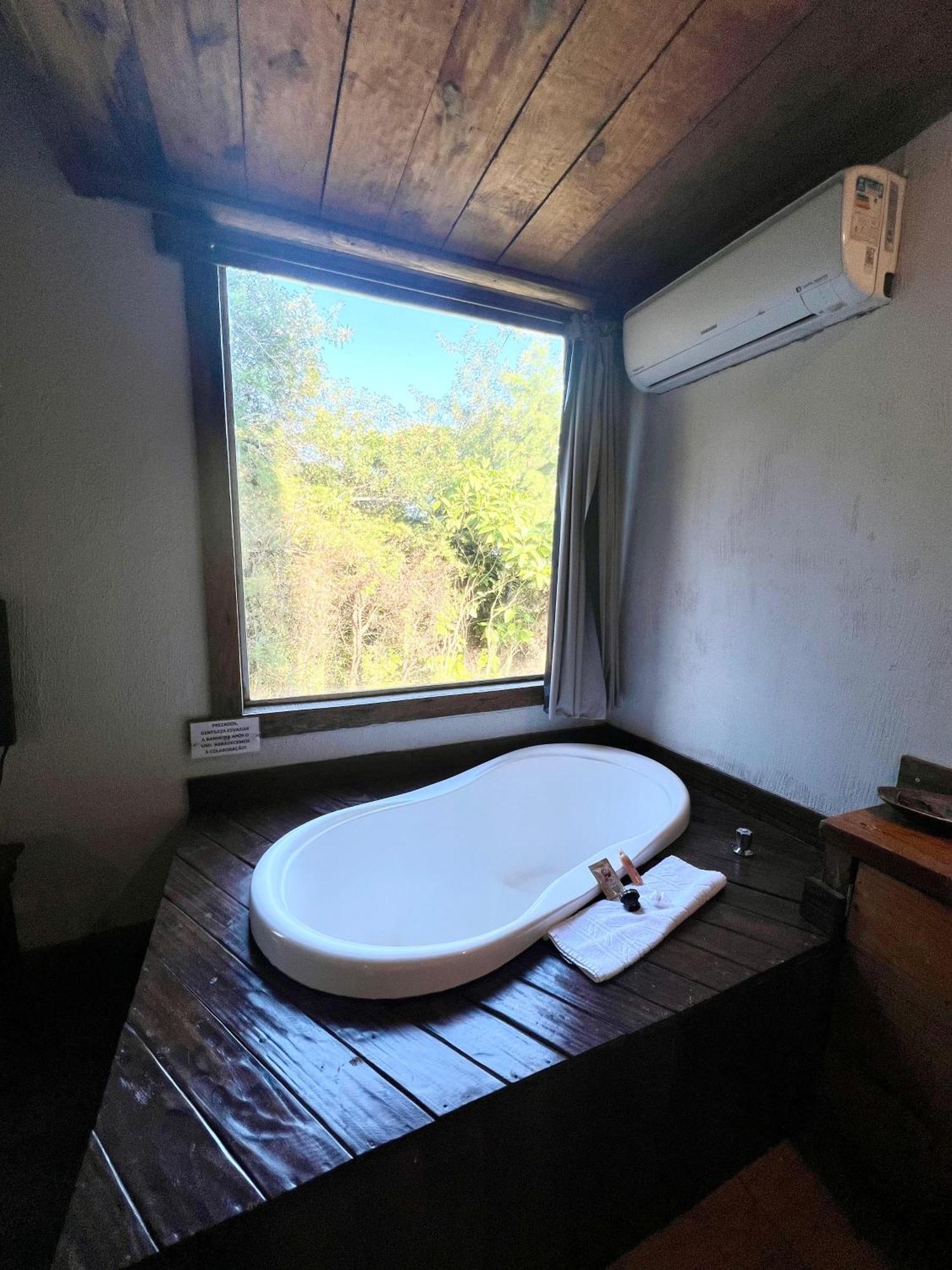 Suíte com Vista do Jardim